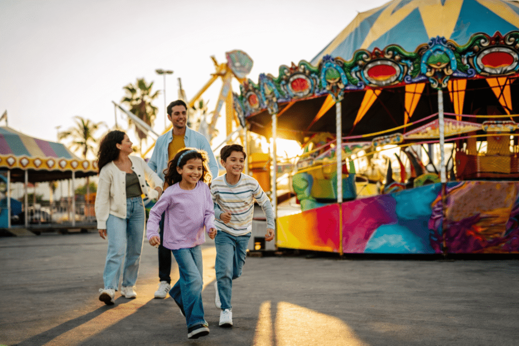 Image of a happy family in a theme park