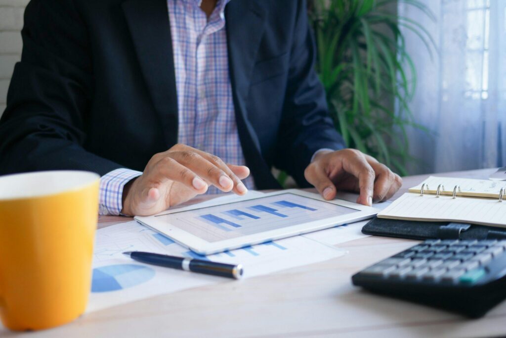 Image of a men who analyze a report.